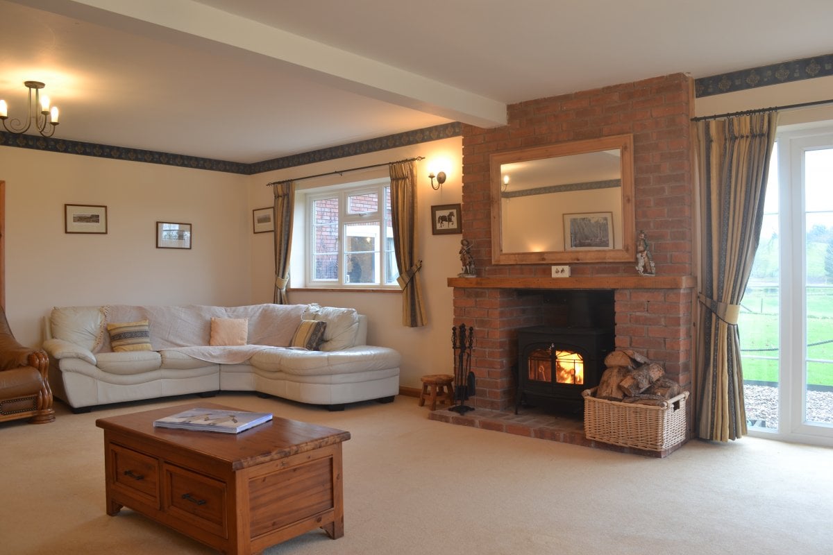 Lounge 1 with log burner and seating for 15