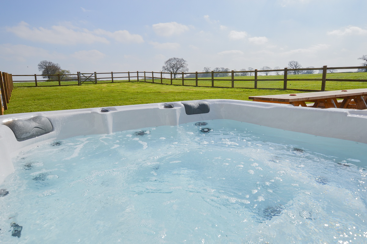 Exclusive use of a hot-tub in private lawns, with BBQ and picnic table.
