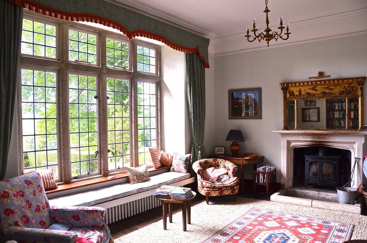 Sitting room window and long window seat - the radiator makes it a Hot Seat in winter