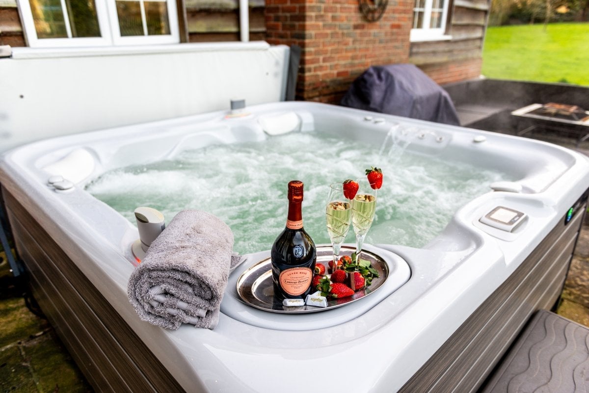 Hot tub on the patio at Langford Farm