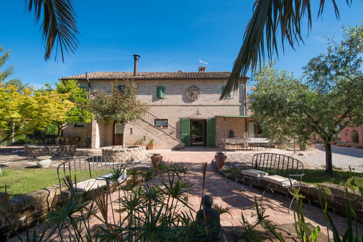 Farmhouse and surrounding patios