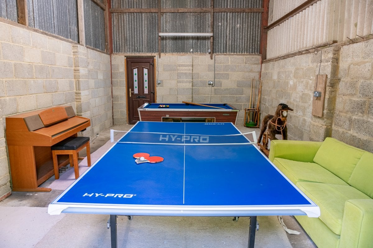 Downlands Farm - games room with pool, table tennis and piano