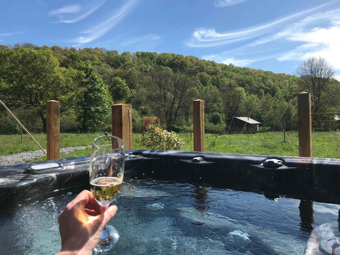 Enjoying bubbly in our hot tubs