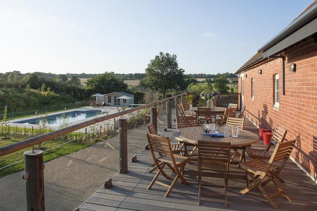 The first floor balcony, accessed directly from the living area, gives breath-­‐taking views across the beautiful Kent countryside that surrounds the Oast.