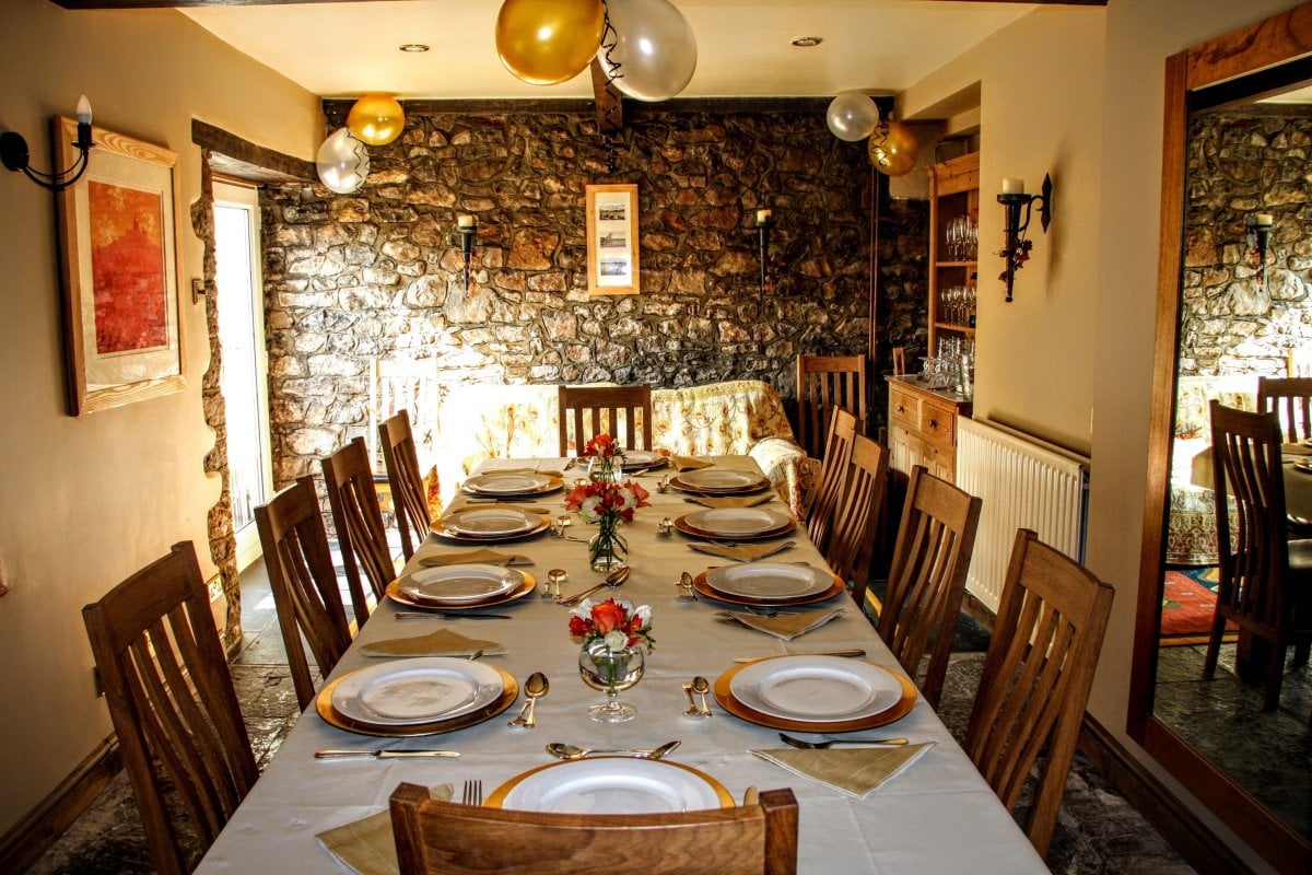 Large dining table with extension seats 14 at The Mendip Gateway