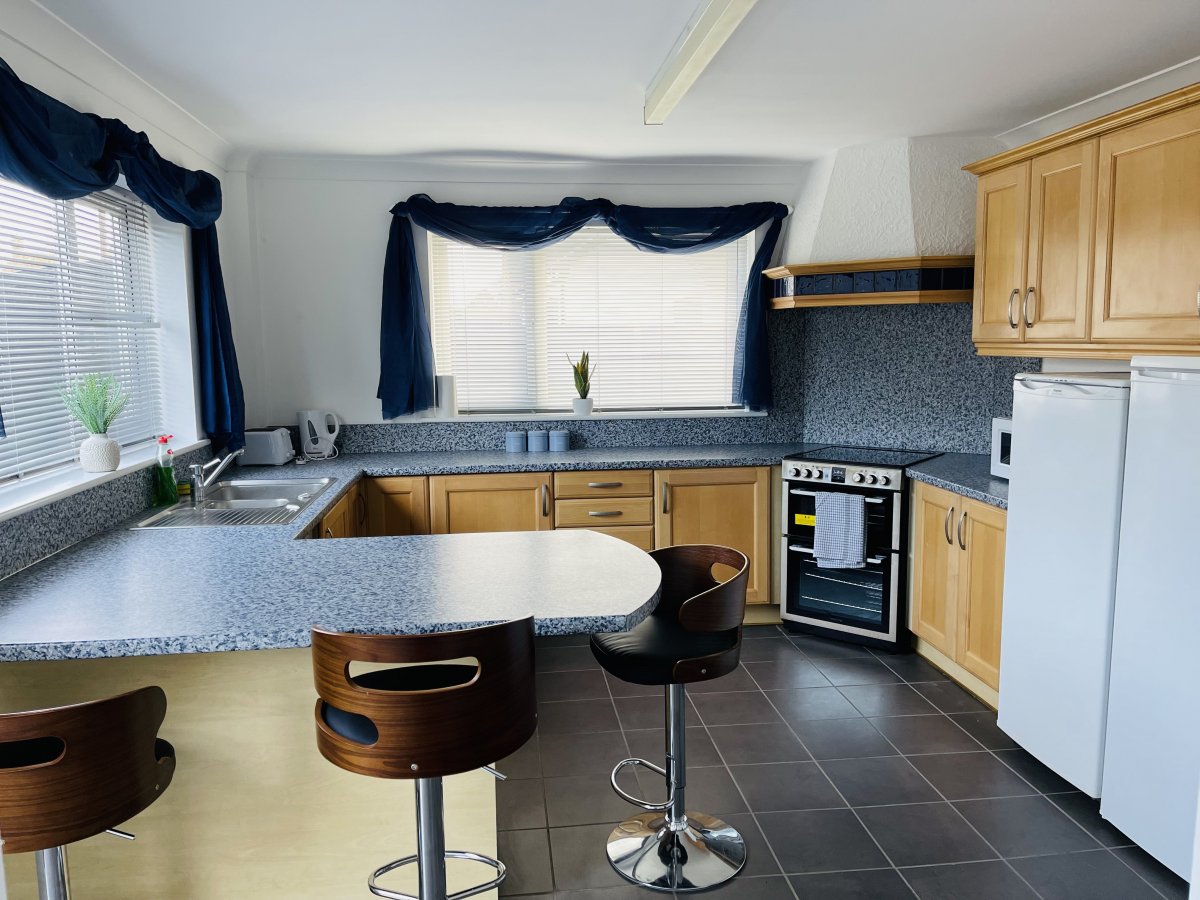 Chacko Cottages 1A - well equipped kitchen diner with sociable breakfast bar