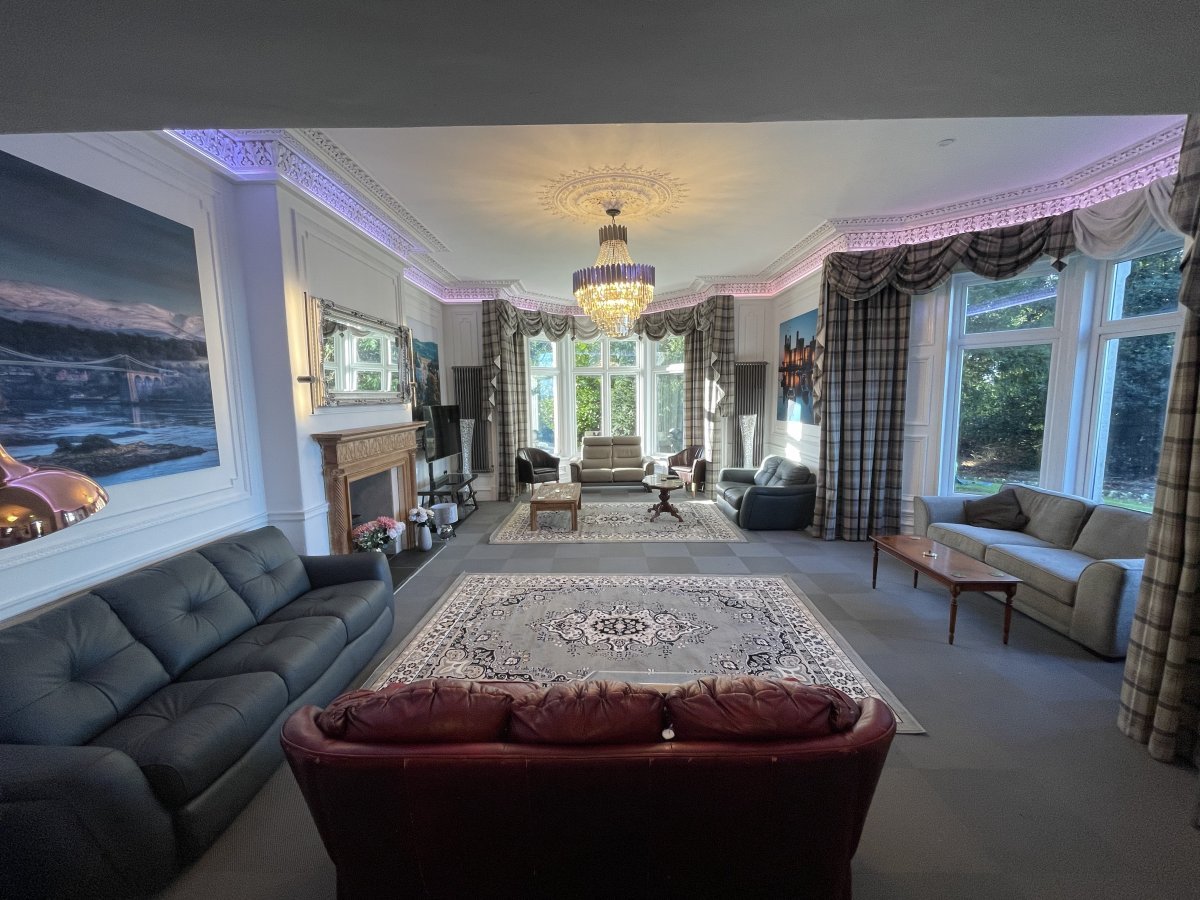 Lloyd George at Plas y Bryn - light filled lounge with stunning picture windows