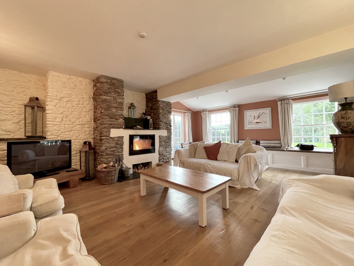 Old Parsonage - huge lounge with comfy sofas and feature fireplace