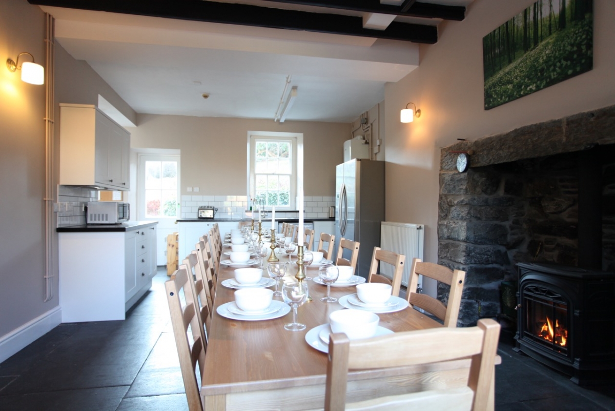 Old Bell House: Kitchen/dining area for up to 20, with coal-effect gas stove, inglenook fireplace and views of estate and mountains