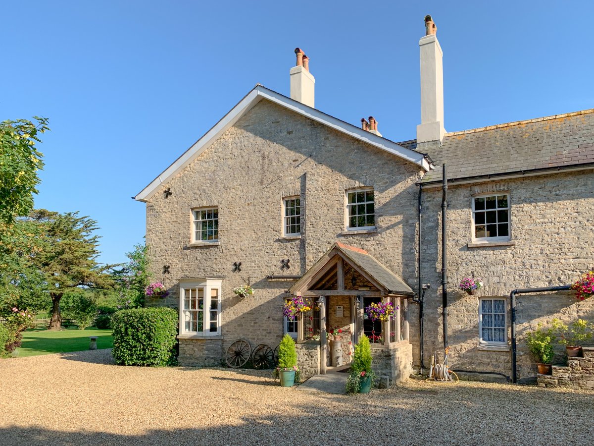 Side view of the house from the private parking paddock