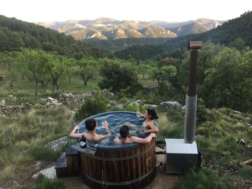 A hot tub with a view at Mas de la Serra