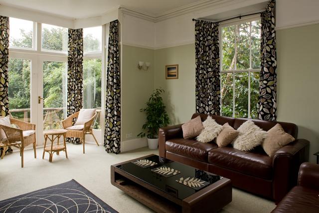 Sitting room with french doors and balcony