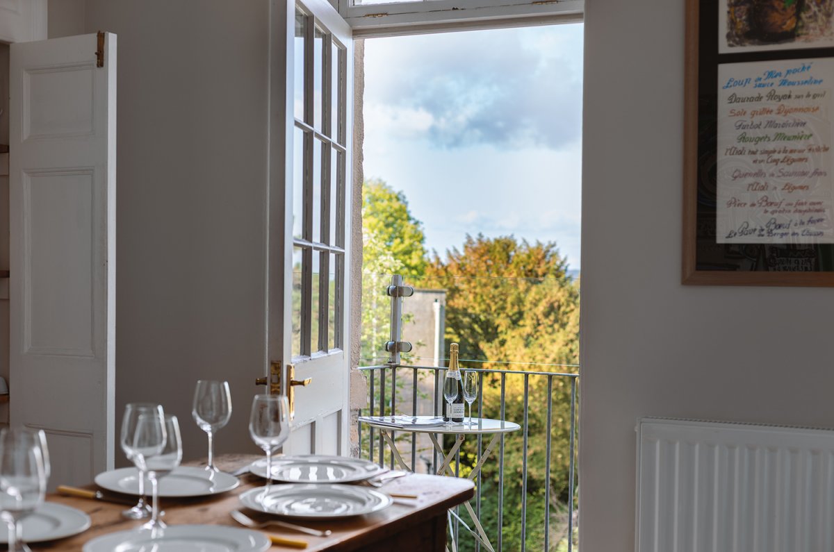 Doors from kitchen/diner open onto the balcony