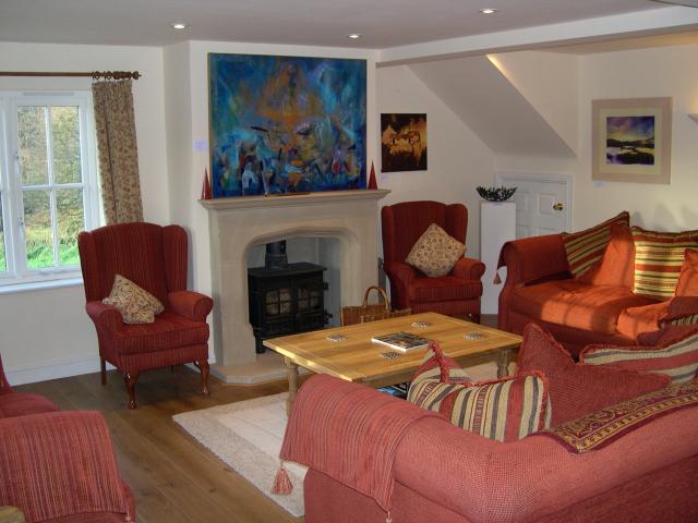 Guest Lounge with woodburner stove, TV, DVD & VCR