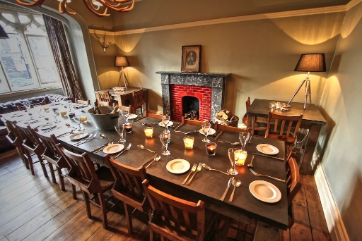 Dining room with large table suitable for formal meetings