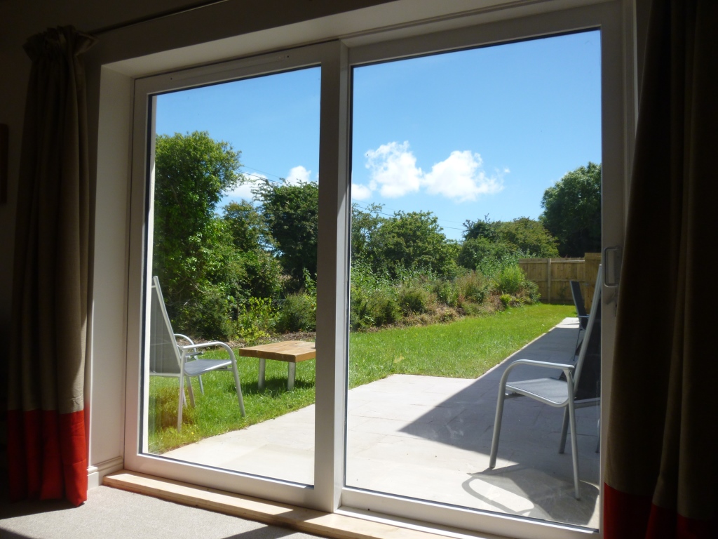 Sisters garden through patio doors