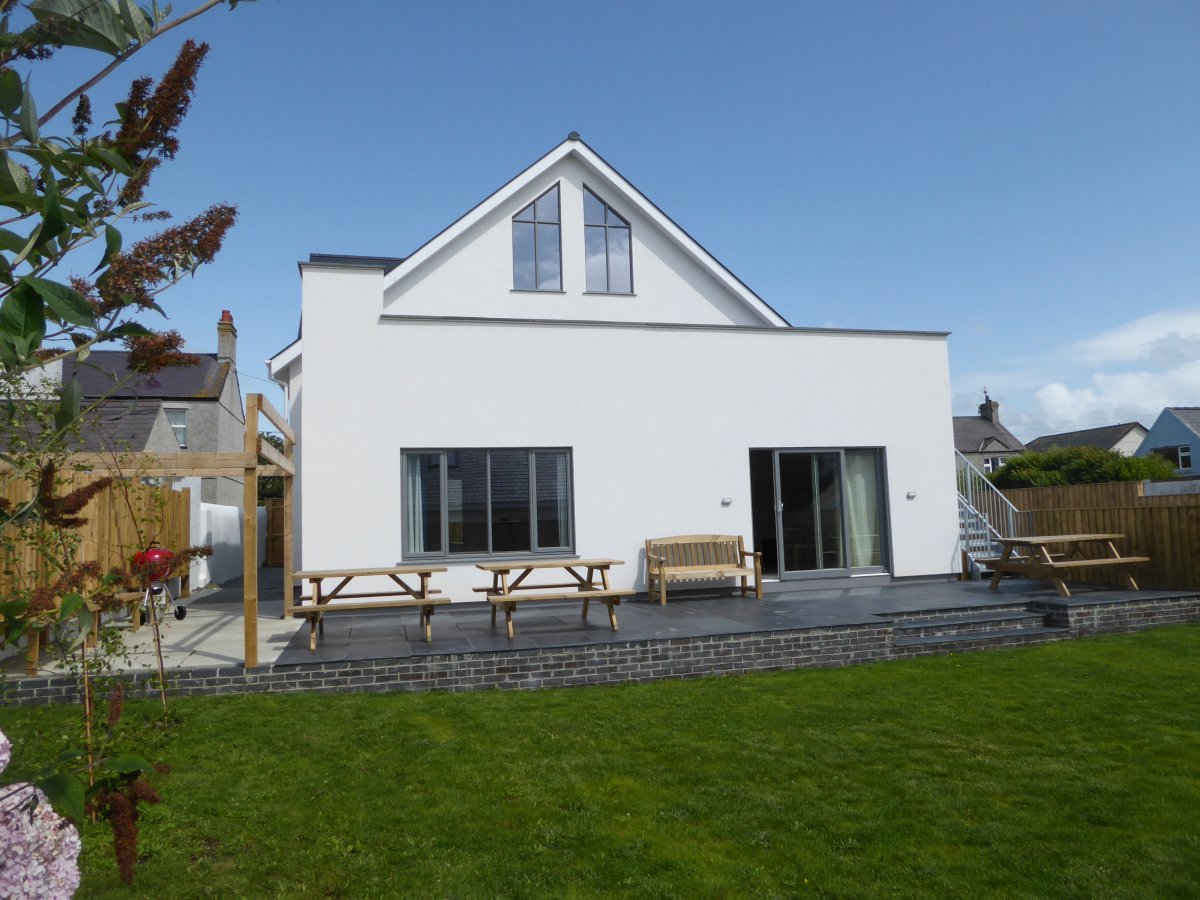 Sunny & spacious patio leading on to fully enclosed back garden