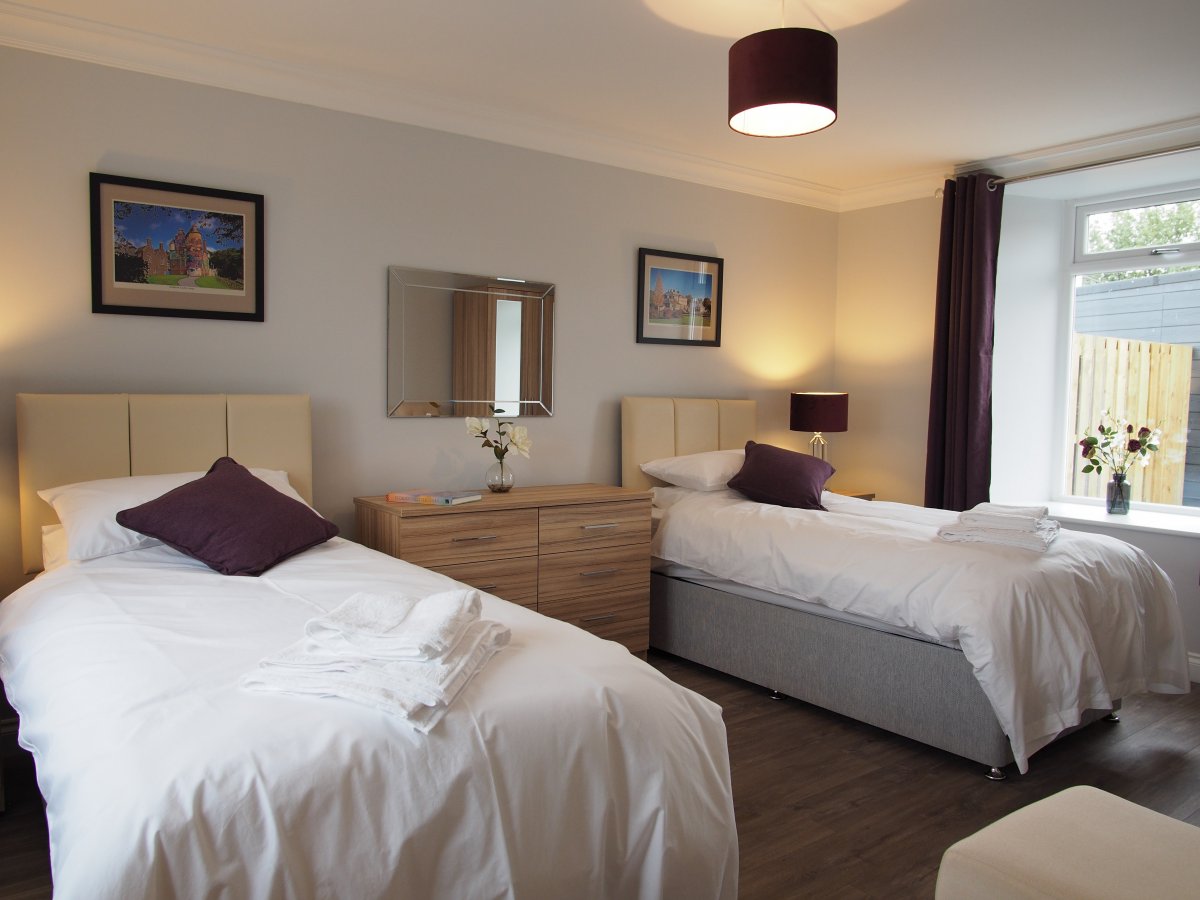 Underfloor heated twin room on ground floor