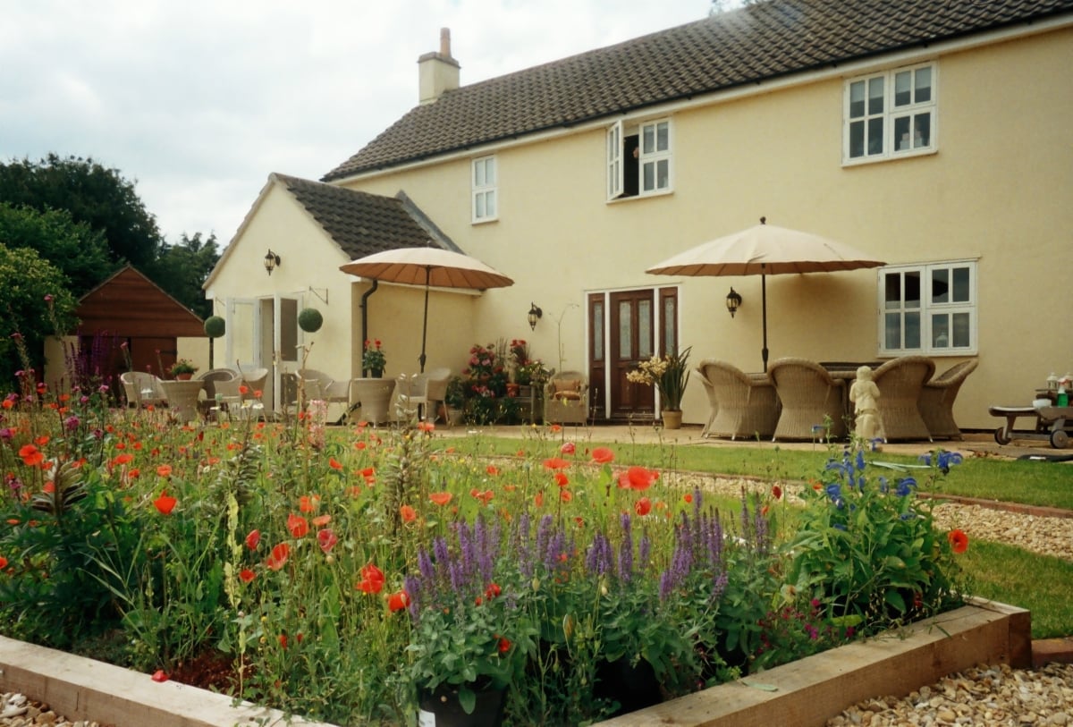 View for Farmhouse seating for all guests on patio with hottub