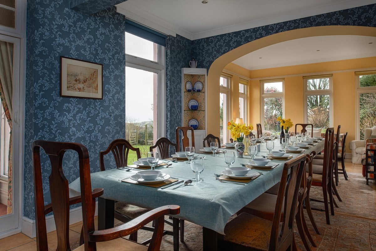 Dining room with long table for everyone to sit and eat together