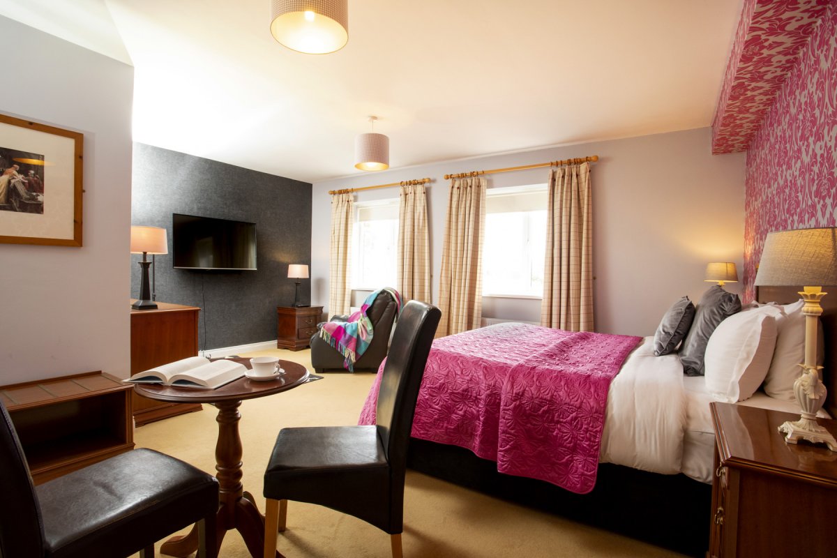 En suite bedroom with superking bed Sleeps 2