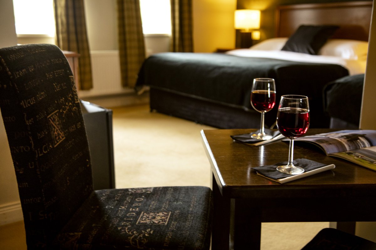 En suite bedroom with superking bed and single bed sleeps 3
