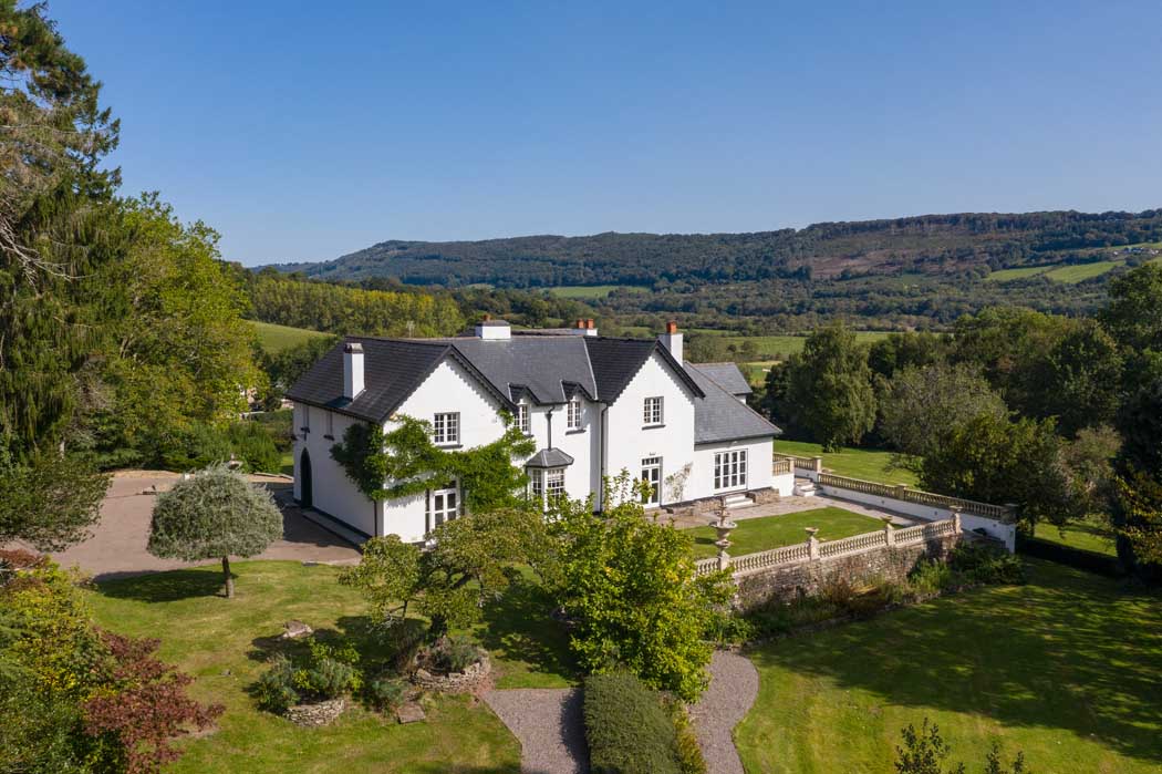 Woodbank House from the side, with rose terrace and garden