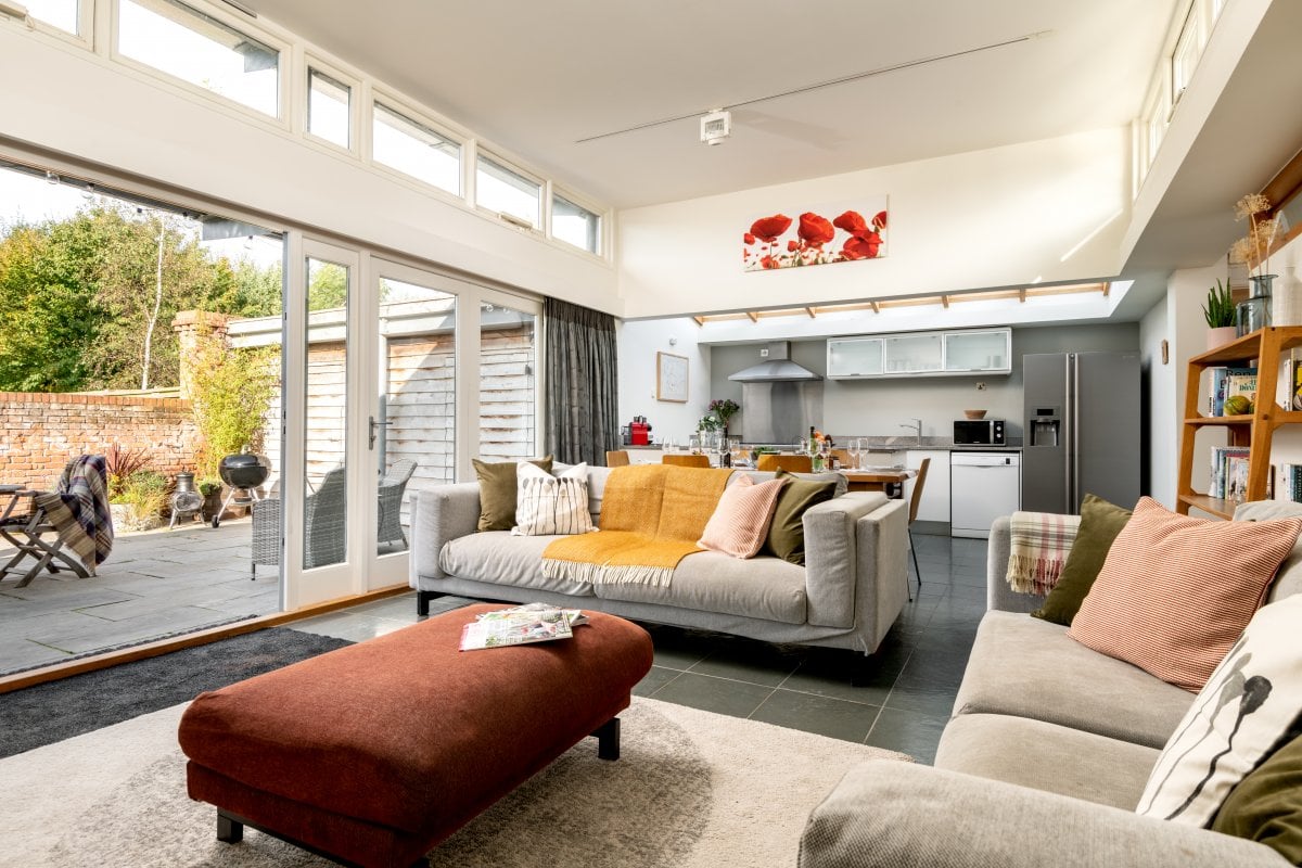 Cranmer Country Cottages - Garden House beautiful living room opening onto the patio