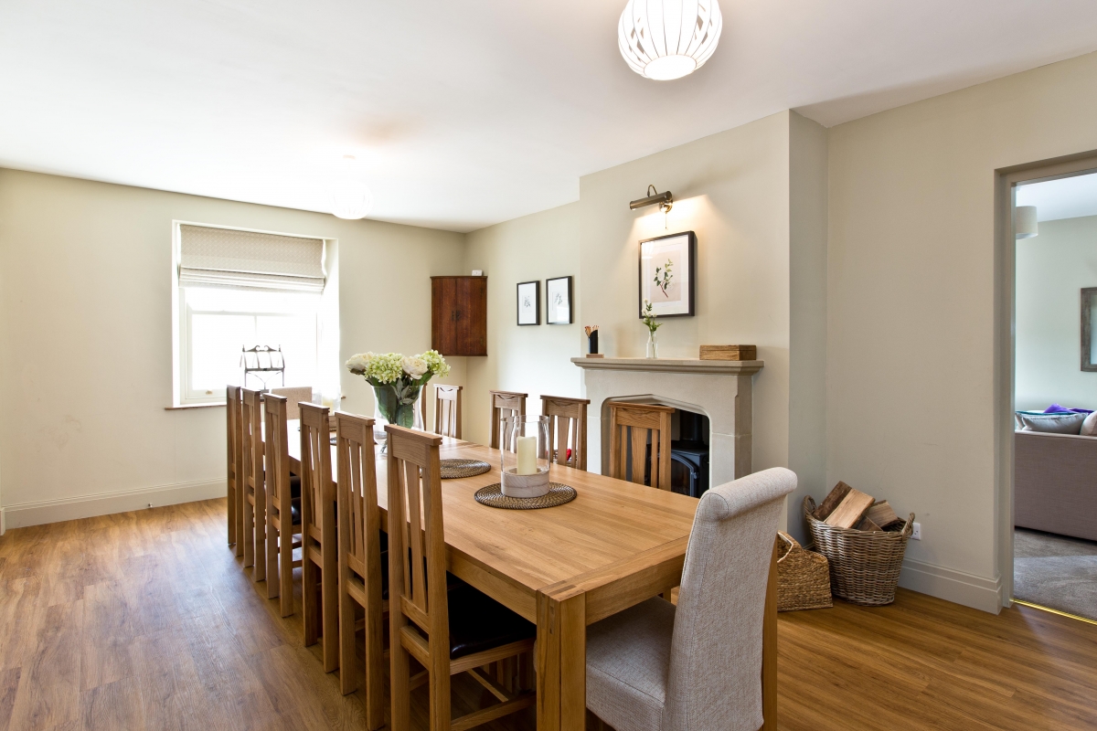 Formal dining for 20 guests in this tasteful and spacious dining room with log burner for added wamth and ambience