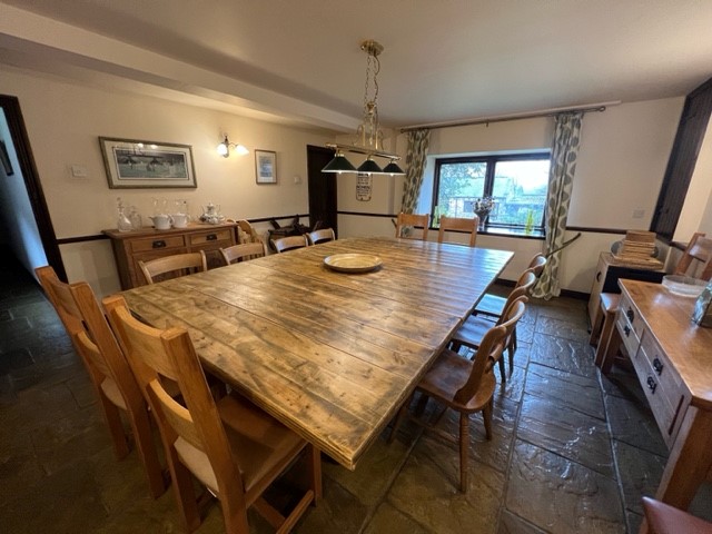 Guests from both cottages can relax and dine together in The Barn