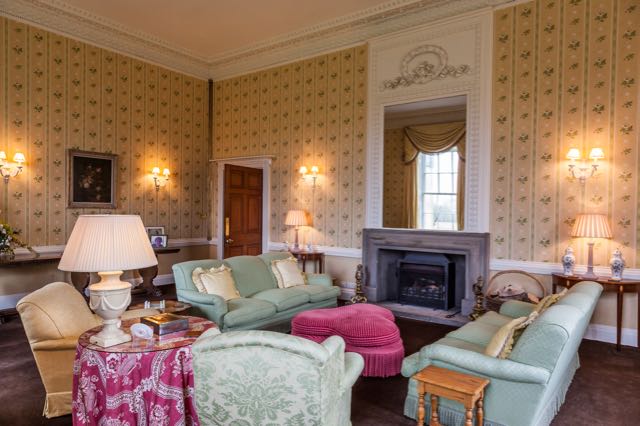 The drawing room with comfortable sofas and Jetmaster fire