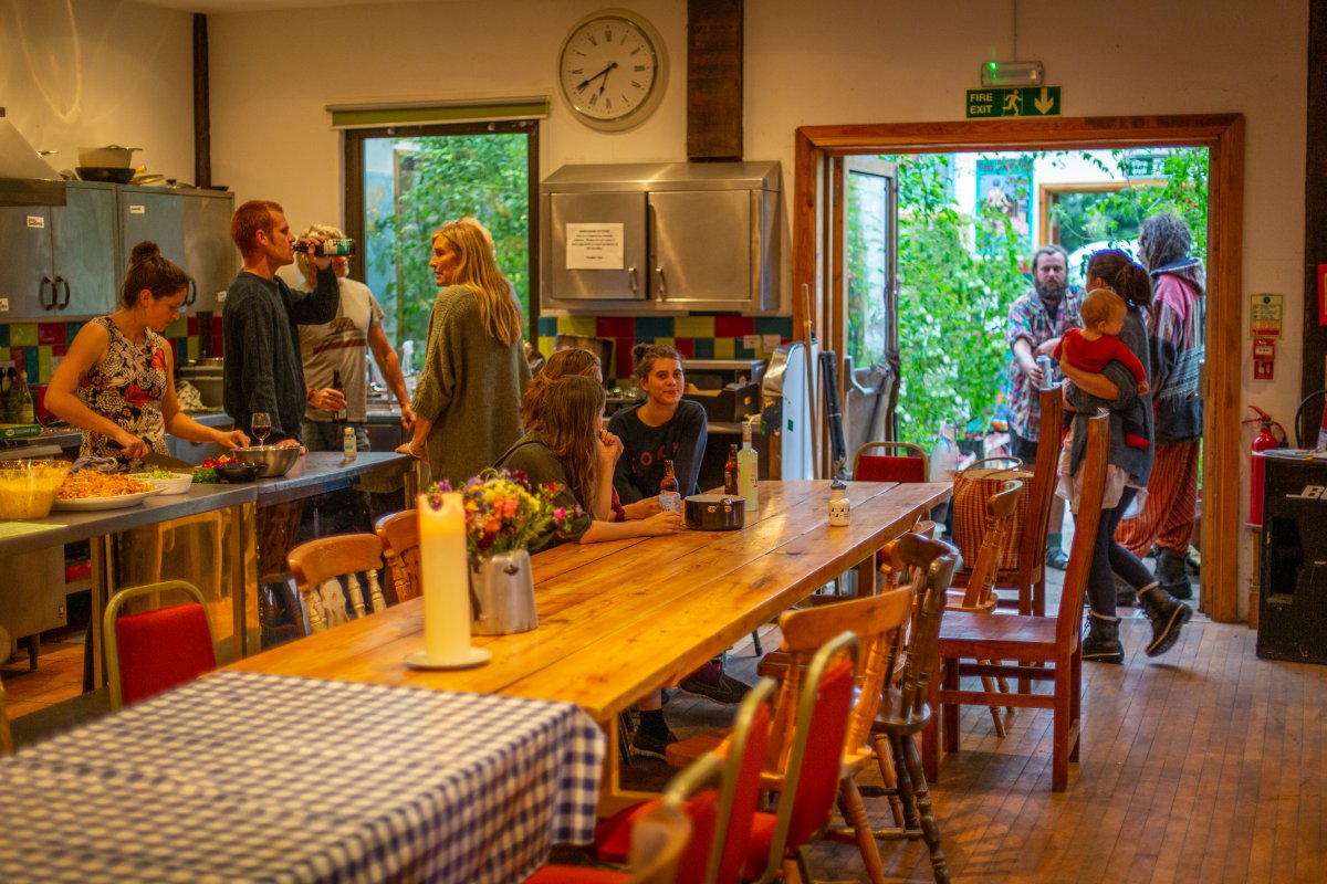 Main hall showing dining tables and conservatory at Holifield Hostel