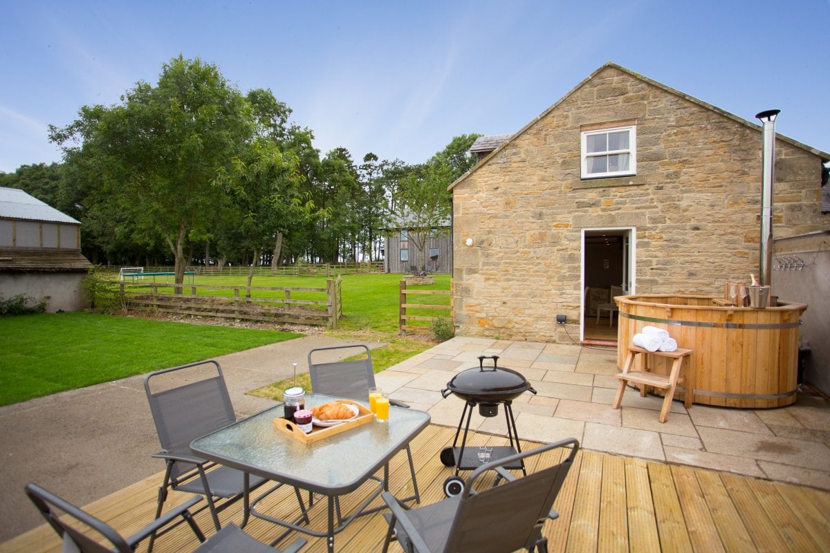 Hayloft outside dining area and hot tub