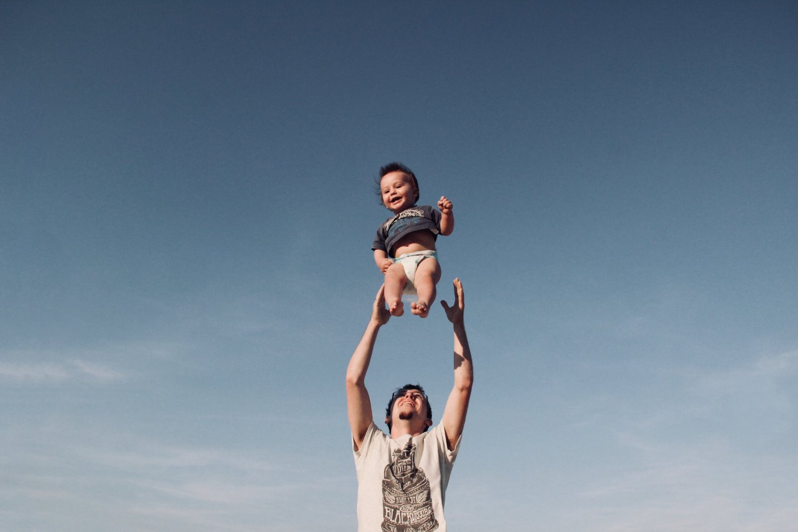 Man playing with his kid