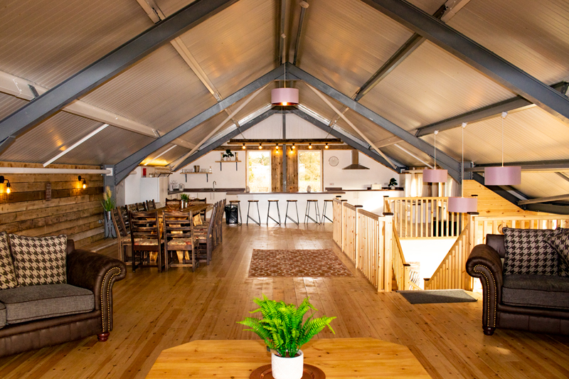 The huge open plan space in Main Barn, for dining, cooking and relaxing together